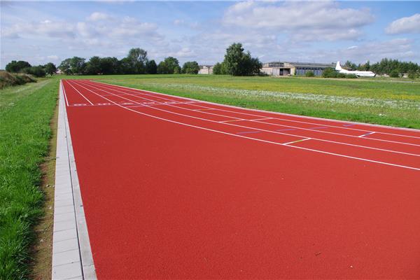 Aanleg kunststof atletiekpiste in PU - Sportinfrabouw NV